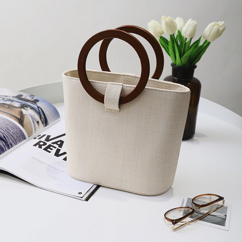 Woven solid wood handbag