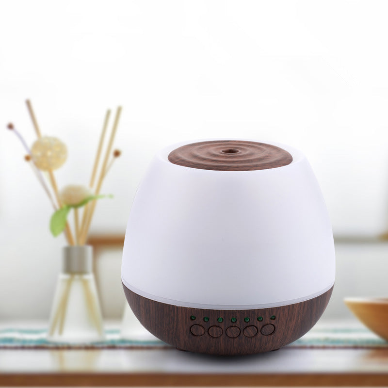 Sonic wood grain aroma diffuser